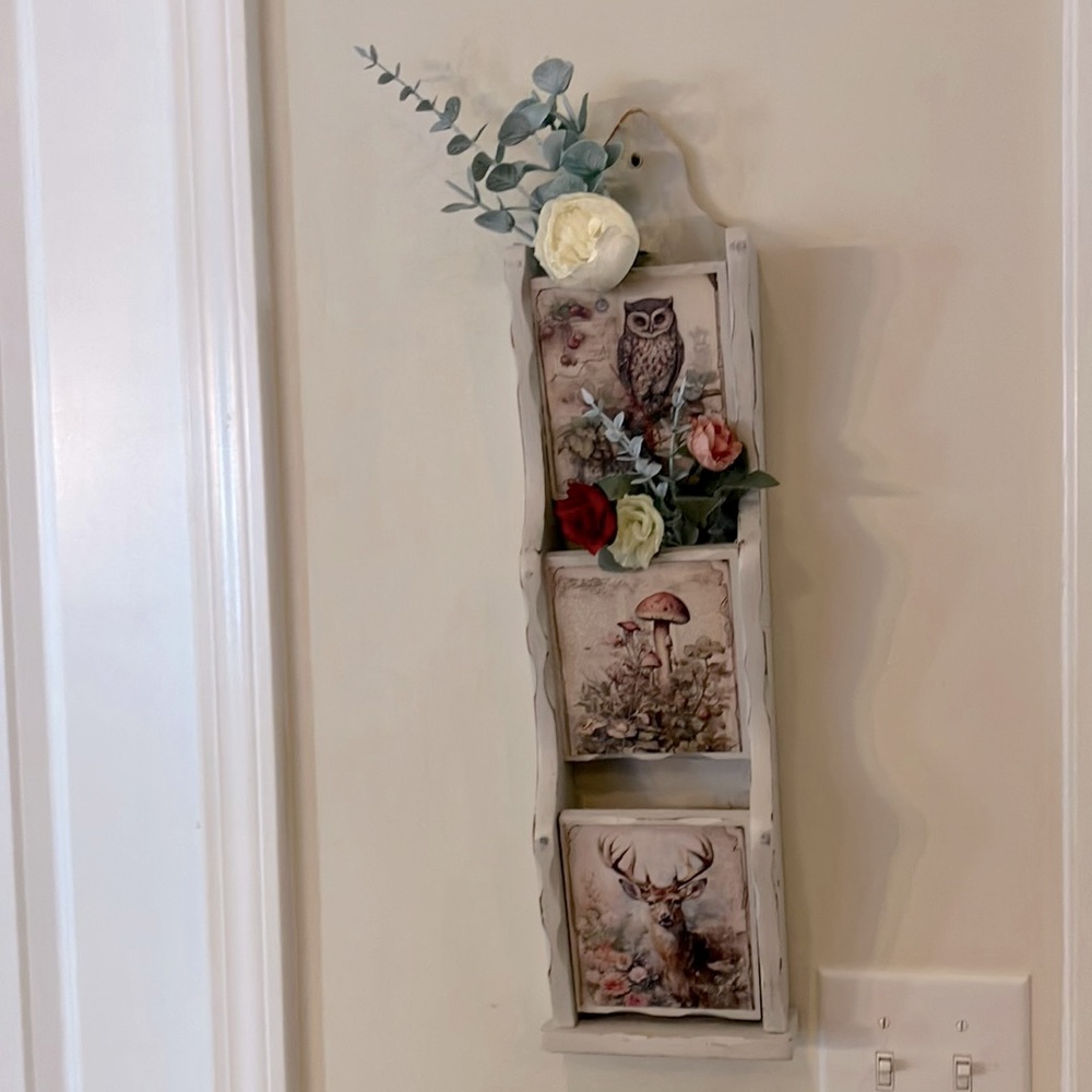 Repurposed letter holder. Decor top two, bottom one for mail.